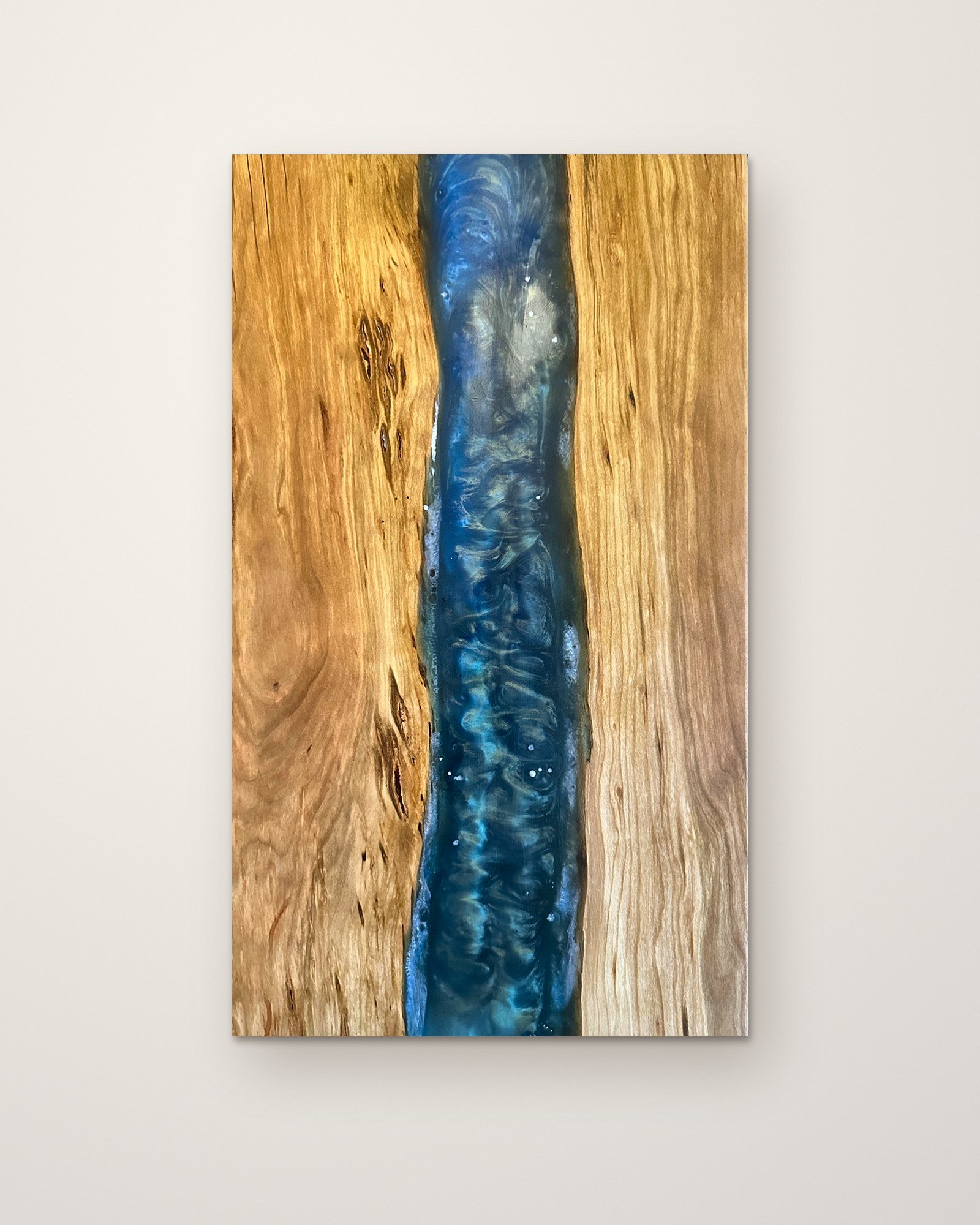 Live-edge cherry and blue resin river serving board